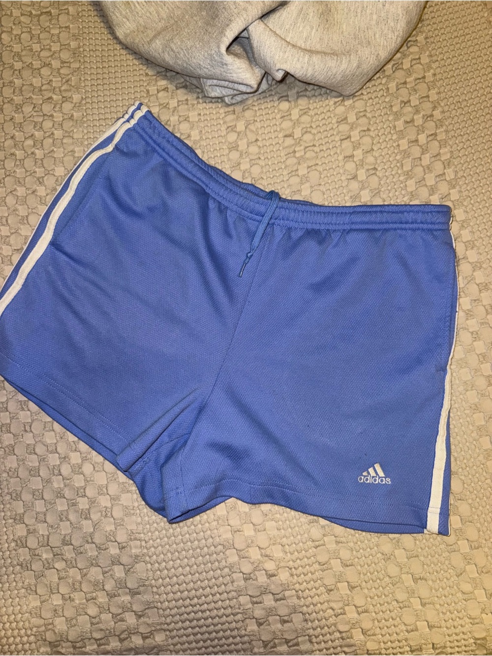 Adidas Women's Blue Athletic Shorts with Side Stripes